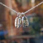 Cast coffee bean sterling silver pendant worn on chain - Bright Side Jewelry Co.